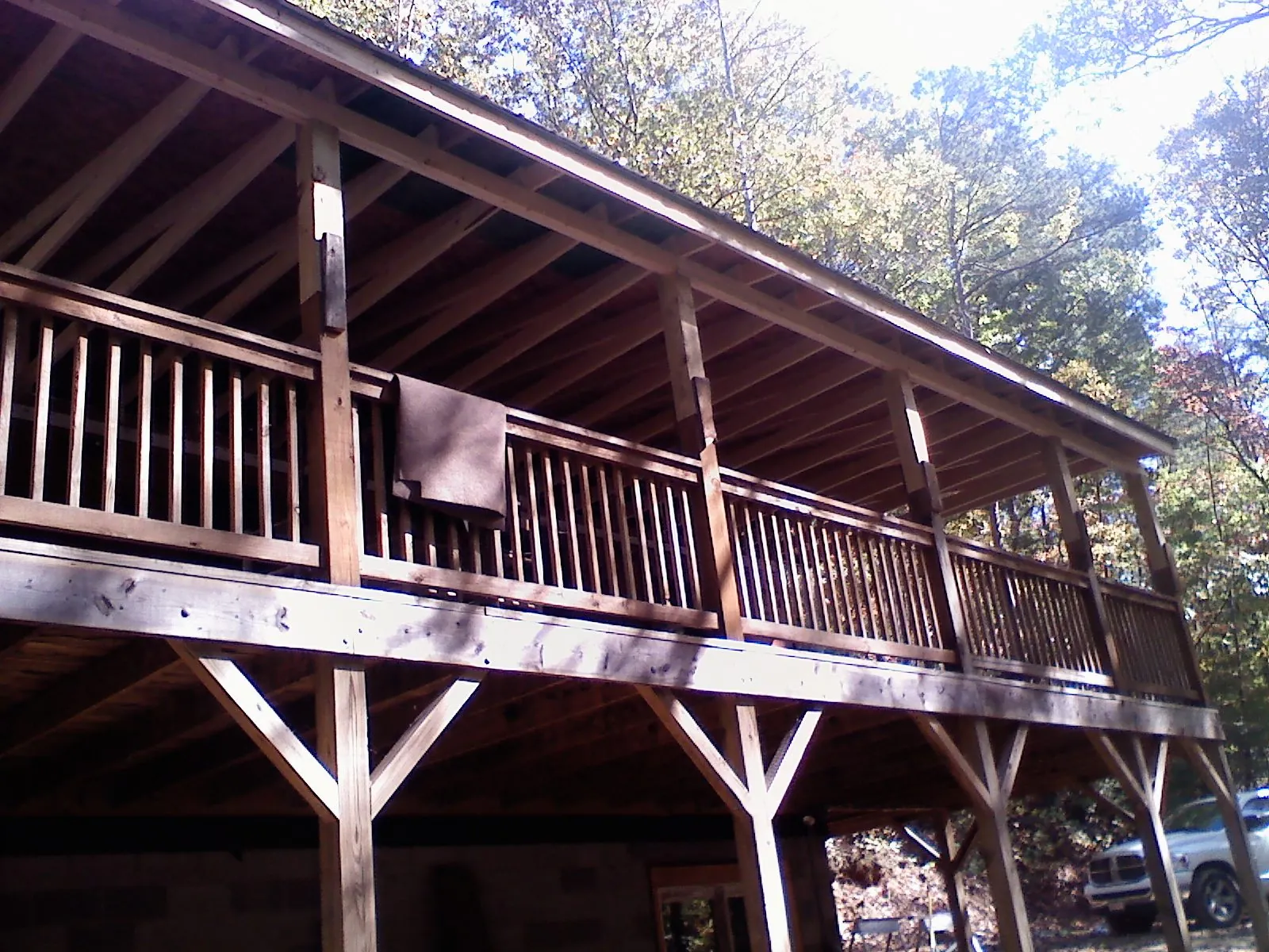 Timber framing under a new elevated porch and deck — Roof Leak Repair in Youngstown by Roofing Brothers